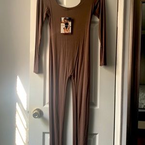 NWT Brown naked wardrobe jump suit